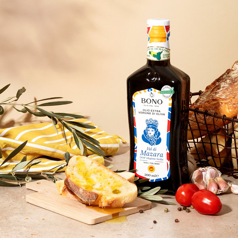 Image of extra virgin oil in a dark glass bottle